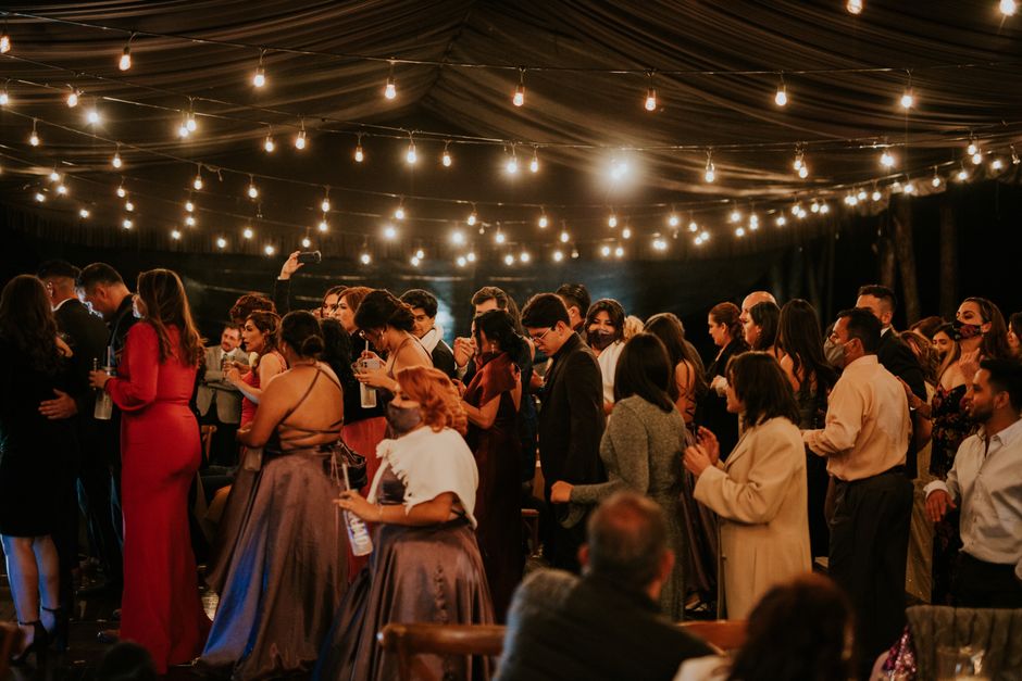 Wedding guests dancing and celebrating at a destination wedding